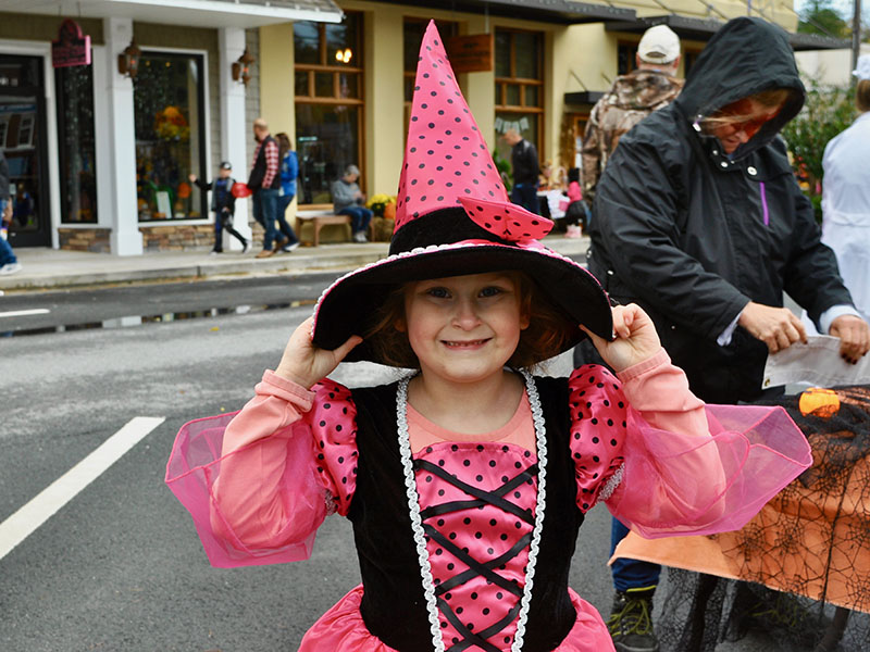 Little witch, Madeline Davis, trick-or-treated in downtown Blue Ridge Thursday, October 31.