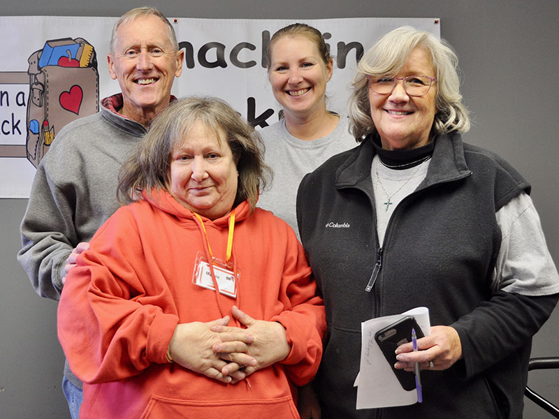 Snack in a Backpack volunteers packed their 20,000th meal of the 2019-2020 school year Wednesday, November 20. Shown are, from left, front, Margorie Dallas and Director Debby Beck; back, Mike Nunnally and Bethany Higgins.