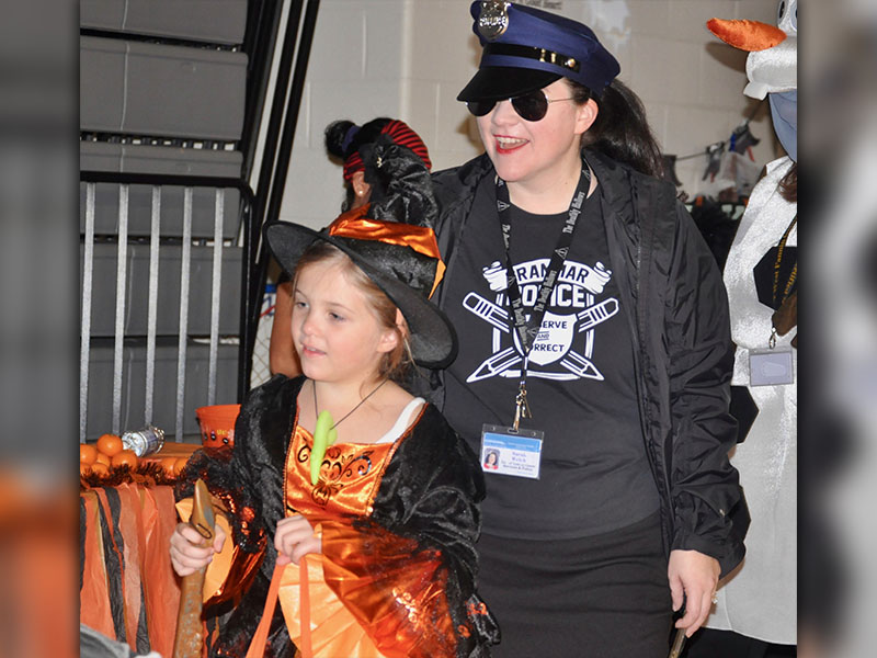 Fannin County School System Director of Instructional Services & Policy Sarah Welch, also known as The Grammar Police, escorted her daughter, Addie Welch, at West Fannin Elementary School’s trick-or-treating event.