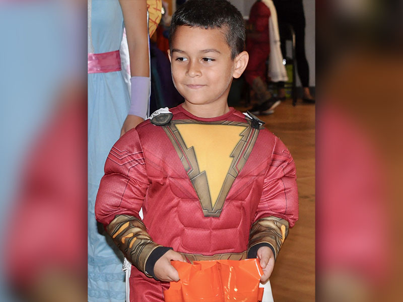 West Fannin Elementary School student Christopher Oler shouted “SHAZAM!,” before turning into the superhero at the school’s trick-or-treating event.