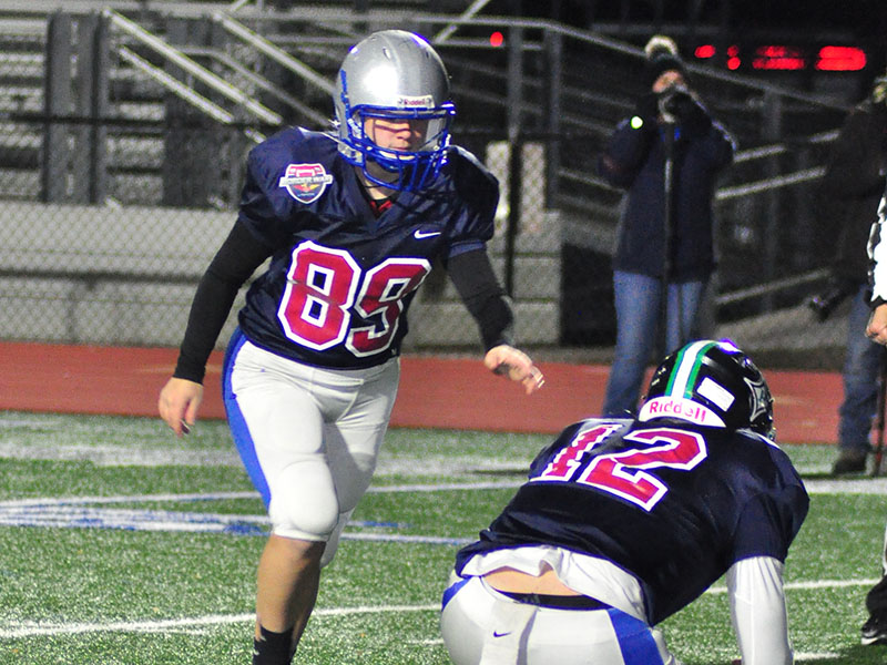 Lady Rebel Sarah Sosebee (89) lines up an extra point during the FCA’s Border War Thursday, December 19.