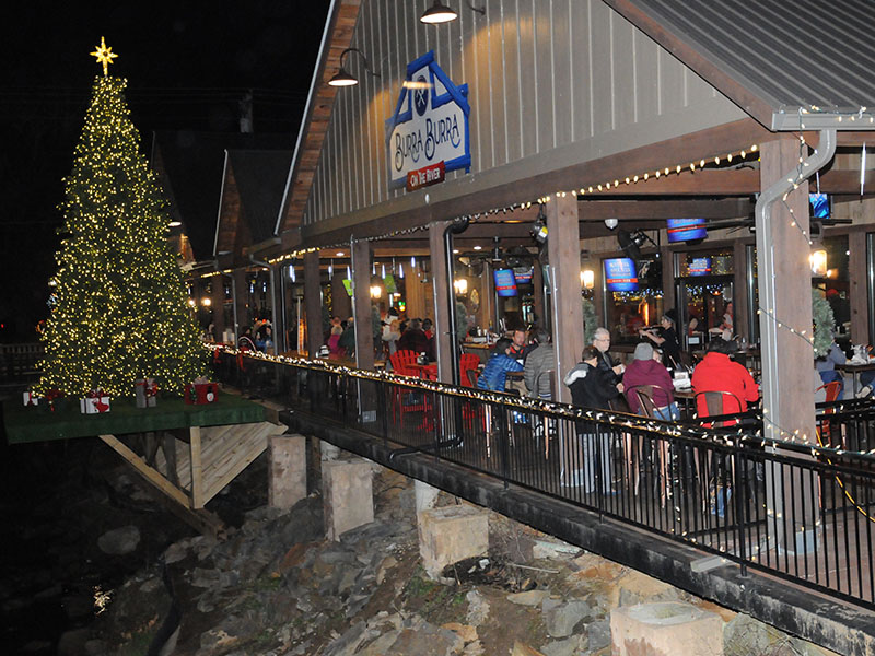 The deck of Burra Burra on the River was filled for the lighting of the large Christmas tree, perched above the Toccoa River in McCaysville. Crowds also filled the streets and lined the bridges for Light Up McCaysville.