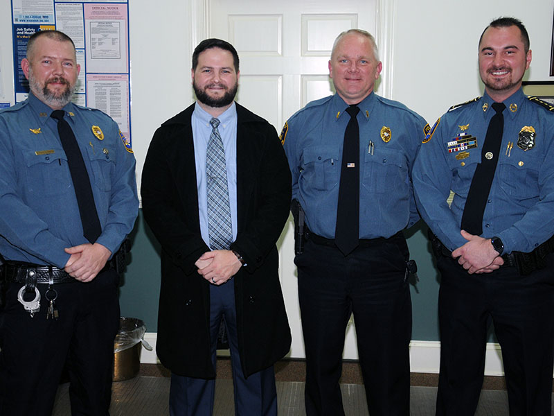 Medals of Valor were presented to McCaysville police officers, from left, Patrolman Cory Collogan, Sergeant Ken Higdon, Lieutenant Billy Brackett and Chief Michael Earley at the December 10 meeting of the city council.