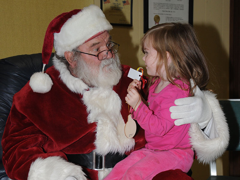 Trinity Jeans was happy to share her Christmas wish list with Santa when he came to the Copper Basin Community Center in Ducktown December 13. All the children who visited received a free toy, made Christmas ornaments and enjoyed other activities.