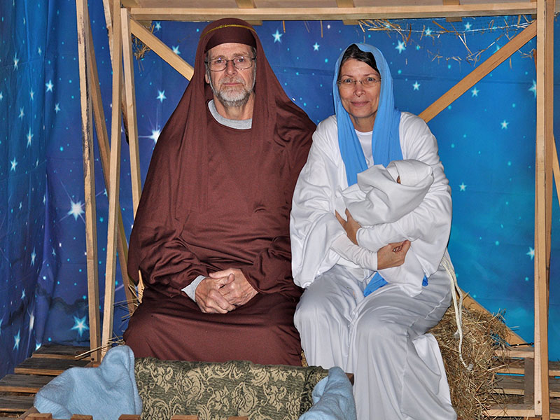 Joseph and Mary, aka Rick and and Starr Callihan, hold baby Jesus in the stable. This scene and others from the story of Jesus could be seen by driving through Mt. Moriah Baptist Church’s Live Drive Through Nativity, The Road to Bethlehem December 6 and 7.