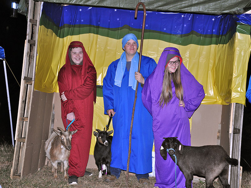 Blake Nicholson, Patrick Conner and Emilee Thomas depict the shepherds in the story of Jesus. The trio participated in Mt. Moriah Baptist Church’s Live Drive Through Nativity, The Road to Bethlehem.