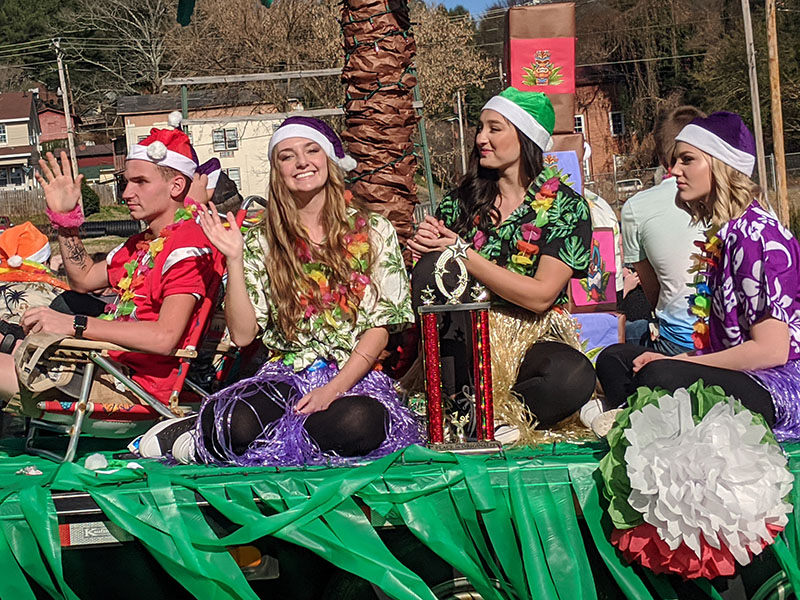 These students created a Hawaiian Christmas float for the Christmas Around the World themed Copperhill Kiwanis Christmas Parade.