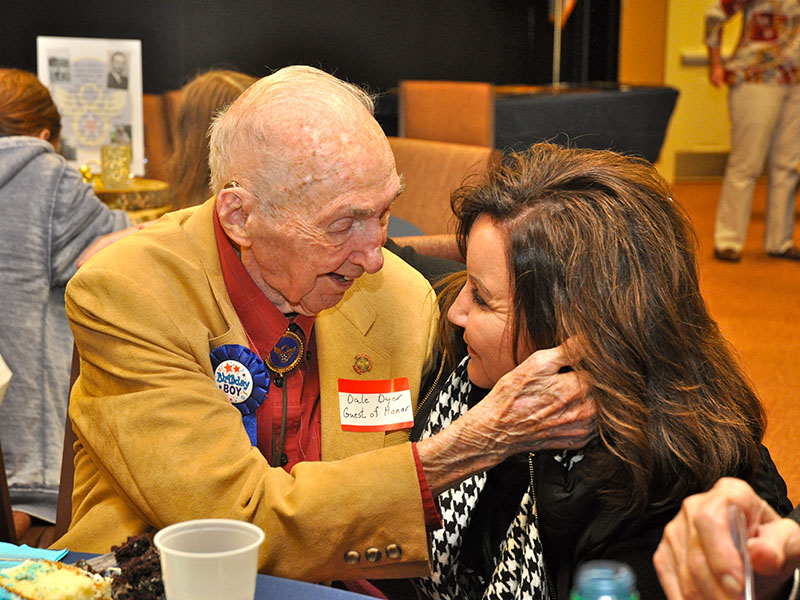 Fannin County celebrity Dale Dyer affectionaly greets his friend and City of Blue Ridge Mayor Donna Whitener during his birthday party held at the First Baptist Church of Blue Ridge’s Youth building, November 30. December 8, Dyer’s actual birthday, has been proclaimed as Dale Dyer Day, in honor of his 100 years and his contributions to the county.