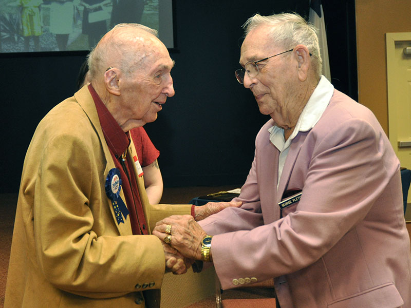 Fannin County celebrity Dale Dyer shakes hands with Lieutenant Colonel George D. Pletcher at his 100th birthday party, November 30. Dyer officially turns 100-years-old December 8, which has been proclaimed by the City of Blue Ridge as Dale Dyer Day.