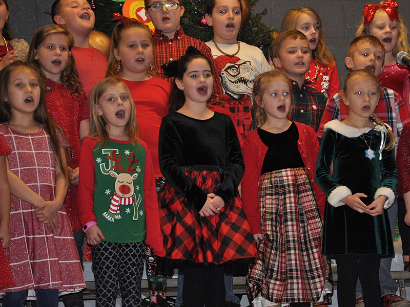 Copper Basin Elementary School first graders belt out the timeless “Silent Night.” Shown are, from left, front row, Meadow Barnes, Kylie Boring, Aisley Walker, Cassandra Sinard and Elyanna Vasquez; middle, Peyton Pack, Temperance Hughes, Weston Cearley and Keanan Roberson; back, Raylan Boring, Ethan Nelson, Giovanni Mazzerella, Sonja Johnson and Chloe Allen.