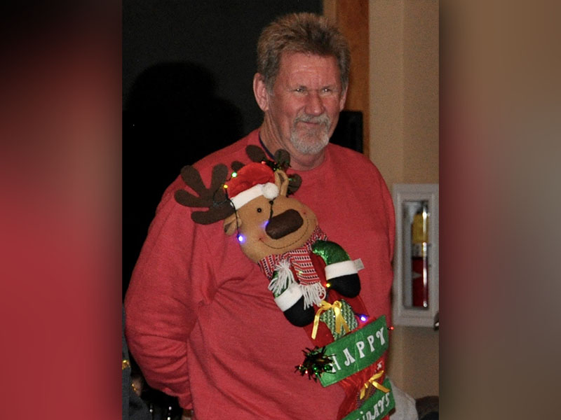 Aaron Allen was chosen by guests for wearing the “Ugliest” Christmas sweater.