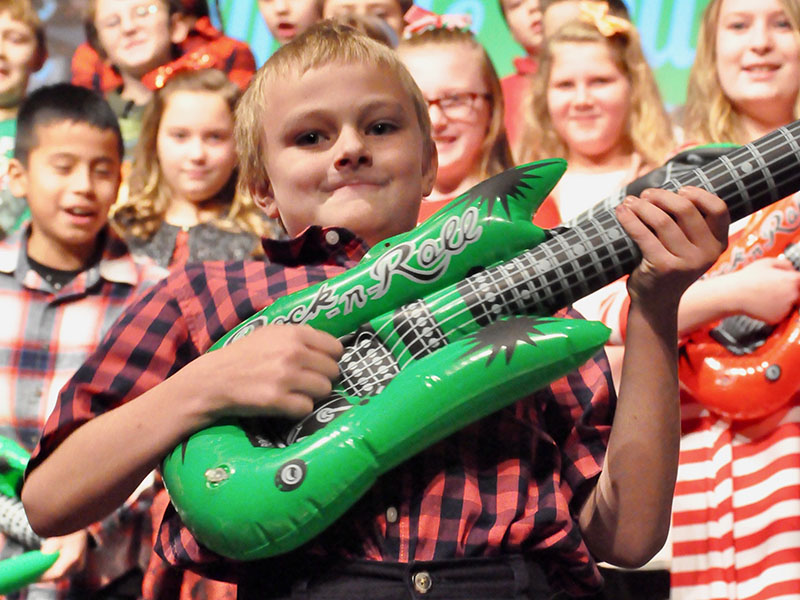 Blue Ridge Elementary School student Cash Ades rocked out on his guitar during the school’s White Christmas program.