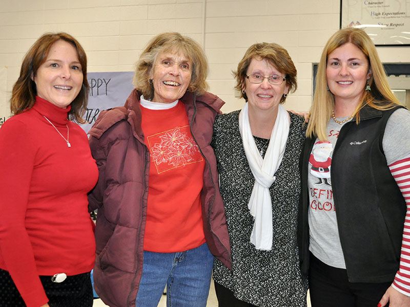 Co-workers and friends gathered to celebrate Fannin County High School Assistant Principal T.C. Dillard’s retirement Thursday, December 12. Shown are, from left, Jennifer Walker, Joy Turner, Dillard and Jill Pierce.