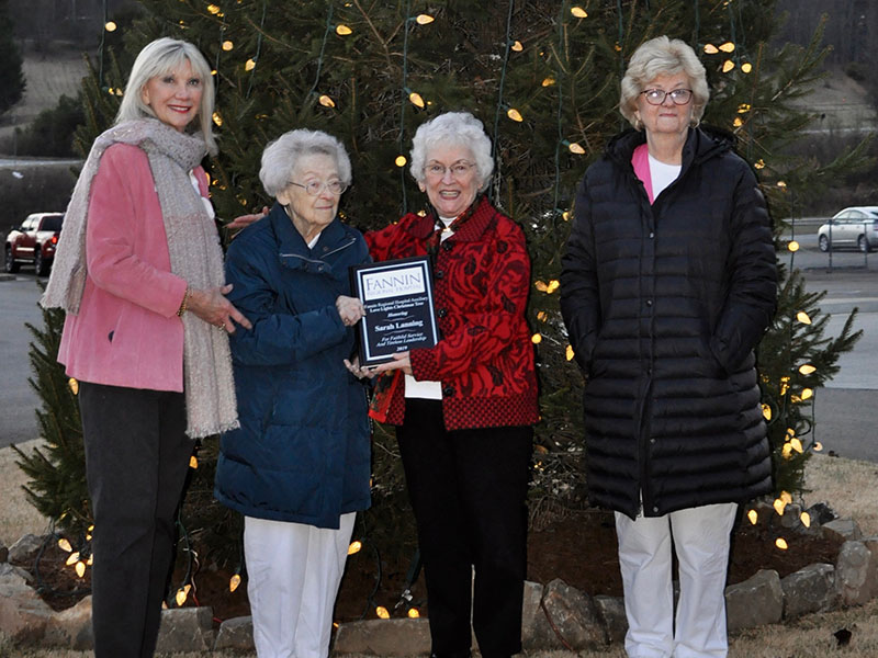 Fannin Regional Hospital auxiliary members, staff and friends traveled to the hospital for the annual lighting of the Love Lights tree Tuesday, December 3. Shown are, from left, Director of Volunteer Services Susan Kiker, former auxiliary president Sarah Lanning, current President Shirley Copeland and Gift Shop Chair Becky Guthrie. Lanning was honored for her work in procuring a permanent tree at the hospital.
