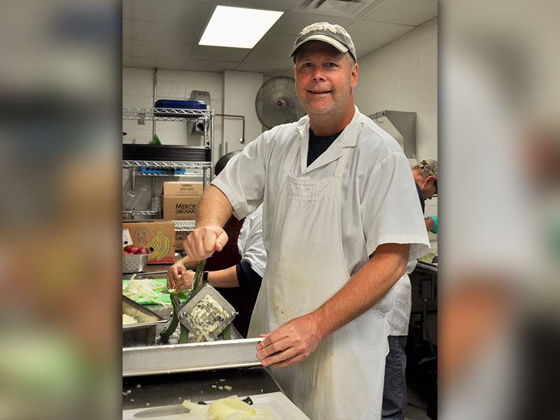 Luke McDonald volunteered with The Good Samaritans of Fannin County Wednesday, November 27 and helped prepare food for their Community Thanksgiving Open Table event.