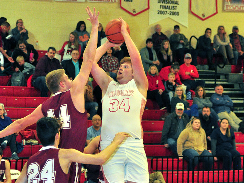 Copper Basin Cougar Logan Tallent shoots a jumper during the Cougars win against Tellico Tuesday, January 7.
