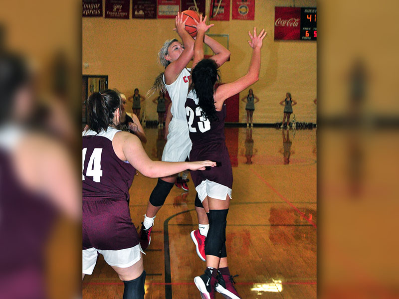Lady Cougar Sapporiah Ross goes up against a defender in Copper Basin’s district game against Tellico Plains Tuesday, January 7.