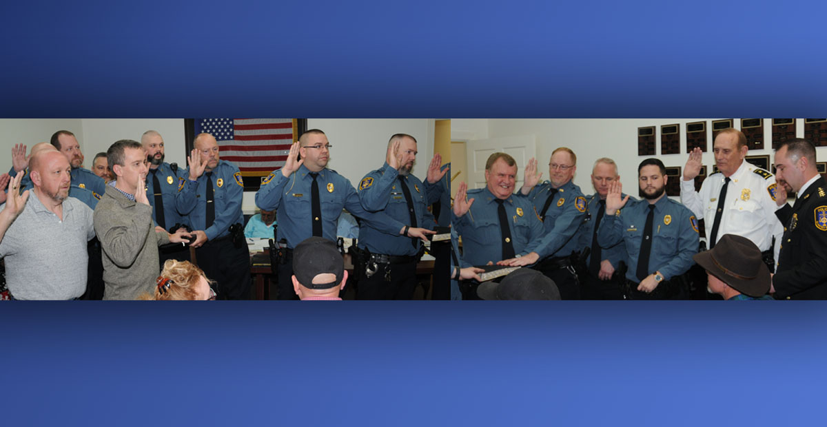 McCaysville Police Chief, far right, swore in the members of his department during the McCaysville City Council meeting Tuesday, January 14, as  these two photos show. Shown, from left, are Chaplain Michael Collis, Brian Collis, Philip Newberry, Chaplain Keith Ritchie, Gary Holloway, Ken Henderson, Robbie Rich, Cory Collogan, Pete Kusek, Tony Petty, Billy Brackett, Bill Higdon, and Assistant Chief Bill Cole.