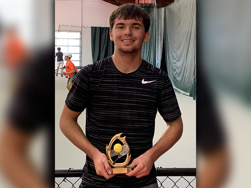 Jacob Gailey shows off his trophy he received for winninga USTA juniors tennis tournament in Chattanooga, Tennessee, January 18-19.