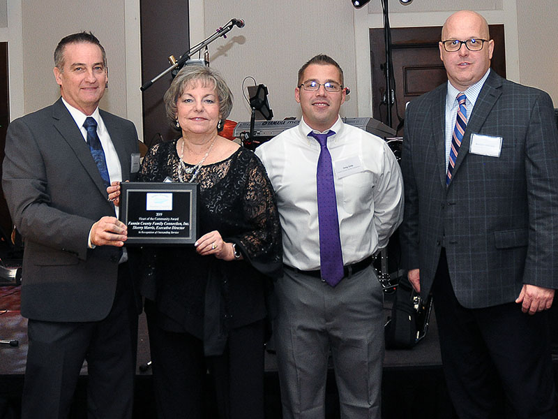 Fannin County Family Connection and its executive director, Sherry Morris, made history by earning the Chamber of Commerce’s first Heart of the Community Award. Shown are, from left, Chairman Frankie Rigdon, Morris, Family Connection Food Pantry Manager Greg Gelp and Chariman Elect Brandon Holloway.