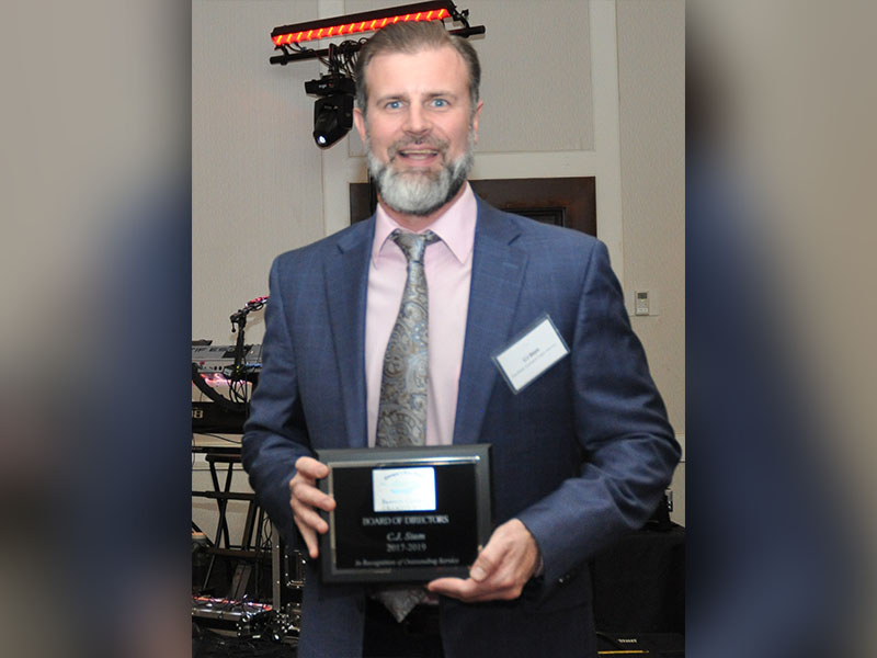 The Fannin County Chamber of Commerce’s retiring members from the 2019 Board of Directors each received a plaque from new Chairman Brandon Holloway to thank them for their service. Shown is CJ Stam with his award.