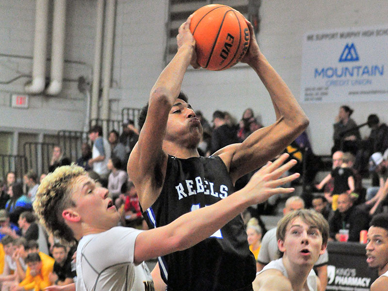 Fannin Rebel Jalen Ingram fights through contact for a two-point jumper during the Rebels’ win over Murphy Saturday, February 1. Ingram played a key role in bringing the Rebels back for the victory.