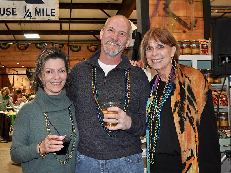 Snack in a Backpack saw hundreds of people travel to Mercier Orchards Saturday, February 22, for their annual Bringin’ the Blues to Blue Ridge event, where funds were raised to help the organization’s fight to decrease childhood hunger in Fannin County. Shown are, from left, Angene Campo, Paul Gerle and Lori Nez.