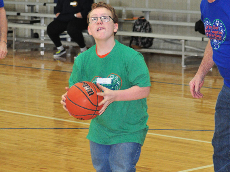 Braxton Graves sinks a jumpshot during the Fannin County Special Olympics basketball competition at the Fannin County Recreation Center Friday, January 31.