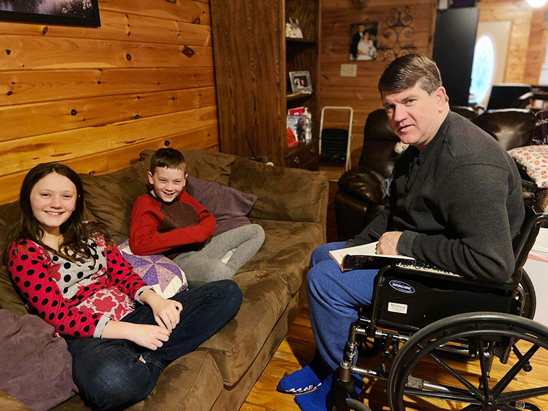 In June 2017 doctors told Jonathan Buller’s family they had no hope he would live through the night after suffering a massive stroke at church that morning. This past Monday morning, March 2, Jonathan was reading to his two children, Katie and Josiah, to help them with their home school lessons.