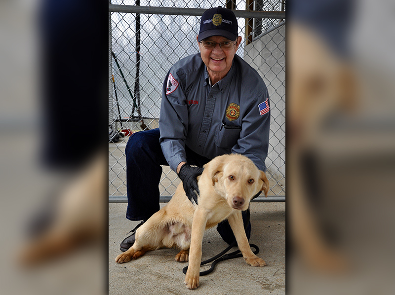 Fannin County Animal Control Officer Pat Patterson holds this male Golden Retriever mix that was picked up on Galloway Road in Blue Ridge March 11. He will be staying at Animal Control until reclaimed or adopted. He has a golden coat with eyes to match. View this sweet fella under Animal Control number 098-20.