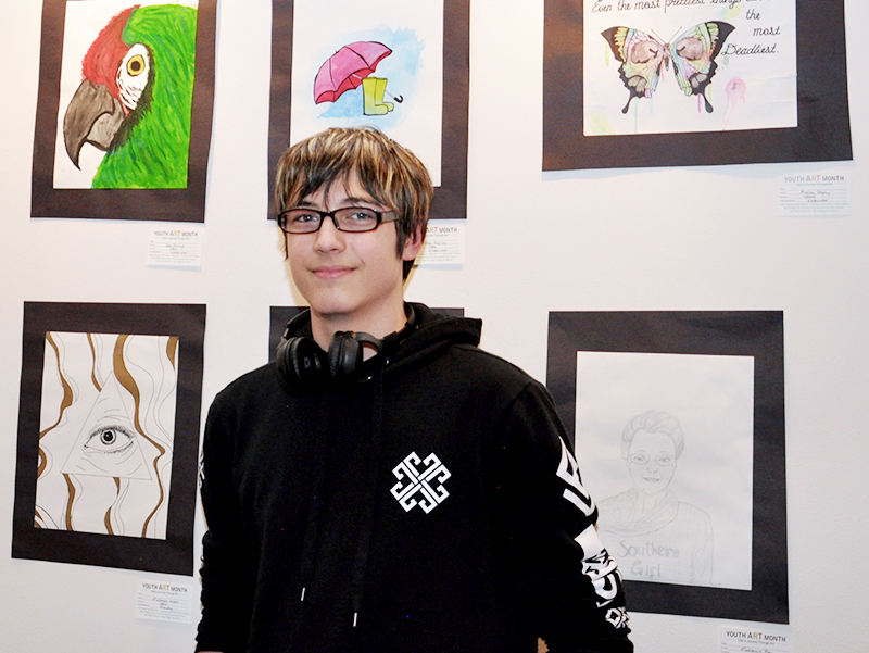 Ian Phillips, Copper Basin High School student, has artwork on display at The Art Center in Blue Ridge. His piece is at the top left. All art is on display until March 26.