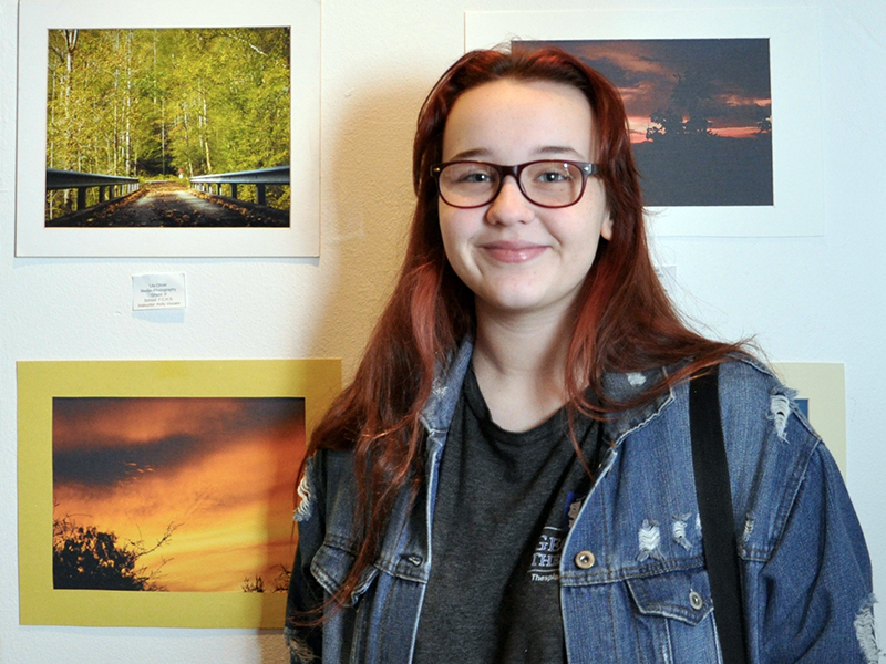 Lily Oliver, Fannin County High School student, has artwork on display at The Art Center in Blue Ridge. Her piece is the photograph at the top left.