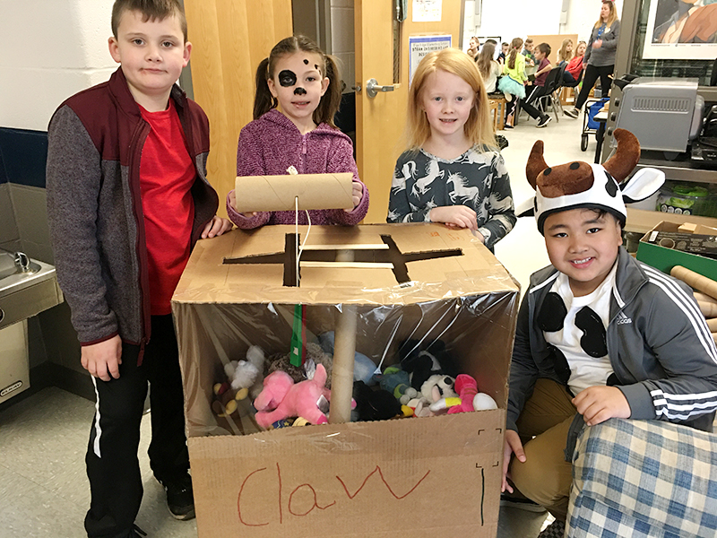 Blue Ridge Elementary School held their annual STEAM Night Tuesday, March 10, where students presented their cardboard arcade game creations after they researched, planned, designed, journaled and engineered them. Shown are, from left, Copen Daves, Molly Prince, Eva Raque and Farrell Roring.