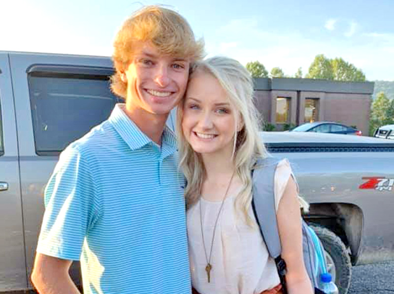 Fannin County High School sweethearts and seniors Grant Sullivan and Amber York stop for a photo in the school’s parking lot before heading to class on the first day of their senior year this past August.