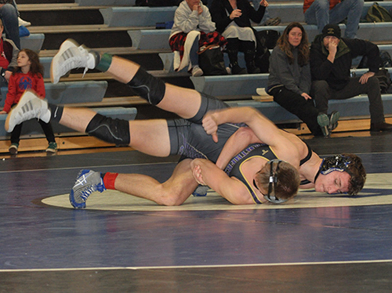 Fannin Rebel McCay Turner works his opponent in one of the Fannin County wrestling matching this past season.