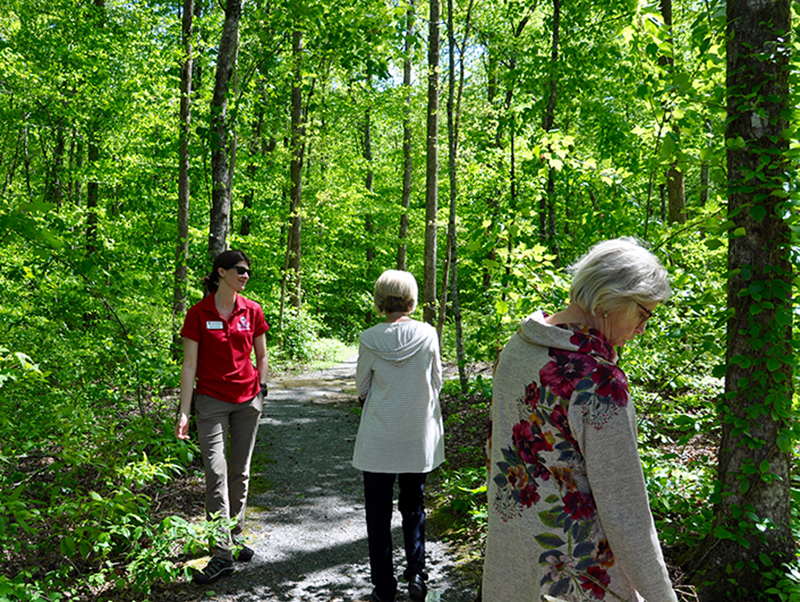 Taking a hike along Jane and Bill Whaley Mineral Springs Walking Trail are, from left, Fannin County Extension Agent Ashley Hoppers, North Georgia Master Gardeners Extension Volunteers (NGMGEV) President Fran Stoecker and NGMGEV Project Chair Alyce Wirtz.