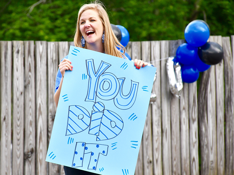 Blue Ridge Elementary School Assistant Principal Gini Tipton smiles as fifth grade students parade through the school during school’s Fifth Grade Drive-Thru Parade Tuesday, May 19.