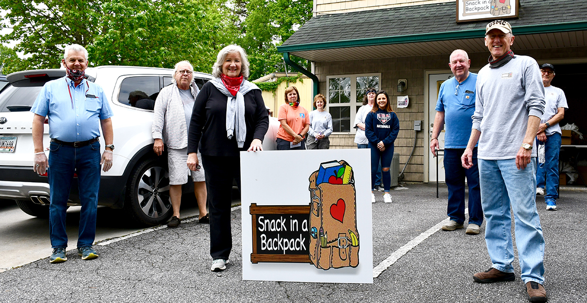 Snack in a Backpack volunteers packed lunches Wednesday, May 20. Among those packing were Executive Director Debby Beck, Mike Nunnally, Fred Wright, Gordon Riddoch, Tim May, Jeanie May, Bailey Mundy, Vicki Smith, Mary Kay Bailey, Mary Langford, Kirk Williams and Rev. Ron Wikander.