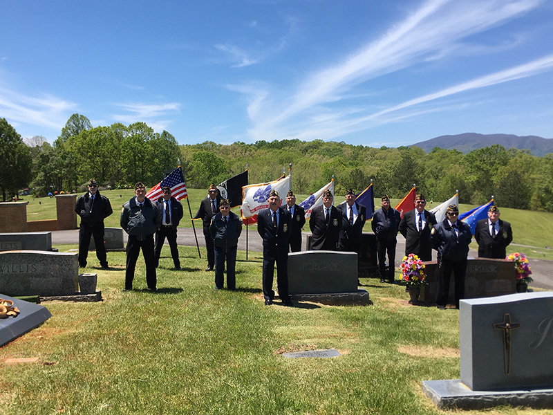 Members of the North Georgia Honor Guard conducted a Military Honors Ceremony for Garnett Webb at Crestlawn Cemetery Saturday, May 9. Shown are, from left, Nick Wimberley, Steve Strickland, Richard Crosley, Richard Pierce, Rev. James Galloway, Sonny Payne, Chris McKee, Bill Stodghill, Paul Hunter, Delos Horton, Ken Campbell, Cindy Gorton and Gerald McMillen.