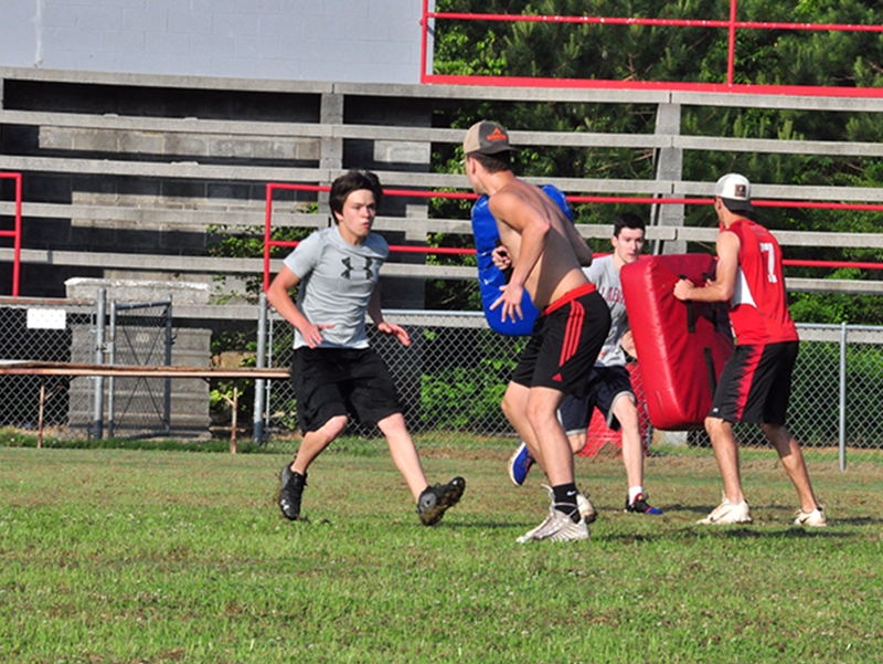 Keegan Sullivan works on a contact drill during the Copper Basin Cougar’s football team practice Thursday, June 4.