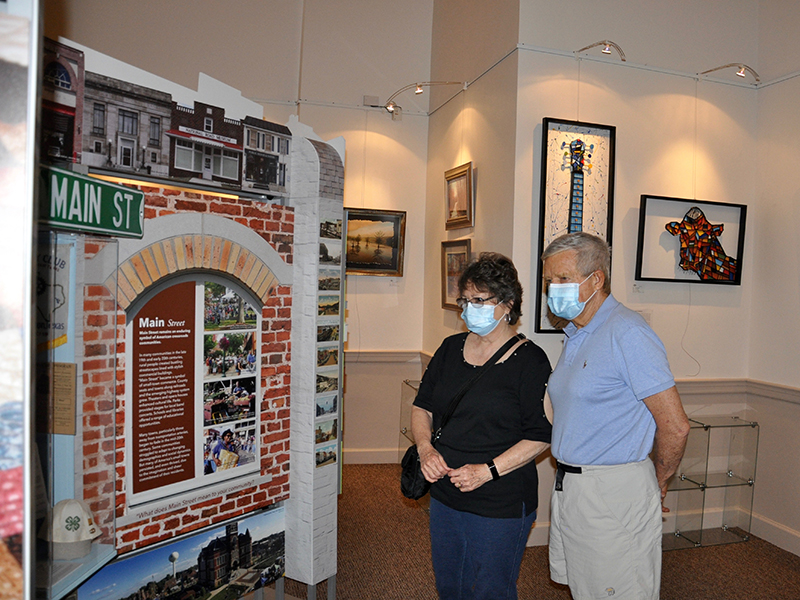 Sandra and Ron Zadroga read about Blue Ridge’s rural history during the Smithsonian Institute’s Museum on Main Street exhibition Saturday, June 20.
