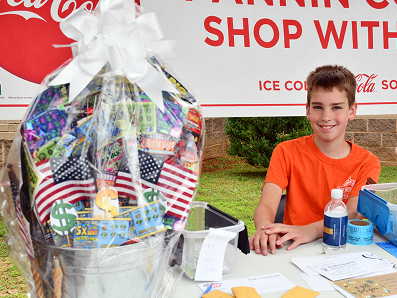 Joshua Burrell distributed raffle tickets during the 2020 Riding the Ridge to benefit the Fannin County Sheriff’s Office’s annual Shop With a Cop. Each year, Shop With a Cop works to provide a brighter Christmas for less fortunate area children. Riding the Ridge was held Saturday, June 27 with participants gathering for the start at Fannin County Middle School.