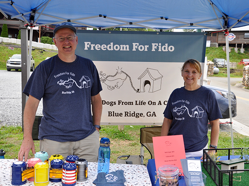 Fritz and Jackie Gilbert, founders of Freedom For Fido, were set up in Tri State Pet Rescue’s parking lot in downtown Blue Ridge Saturday, July 4, trying to raise funds for their organization.