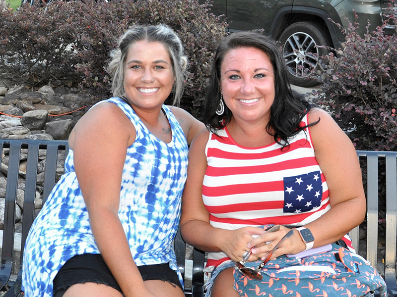 Amanda Morris, left, and Amber Henderson awaited the annual fireworks display in McCaysville Friday, July 3.