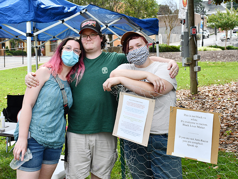 Organizers of the Silent Rally for Respect, Peace, and an Equitable Future for All included, from left, Idriya Arnold, Nathaniel Arnold and Jess Abernathy.