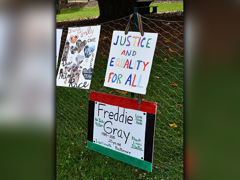 RIGHT: Artwork calling for justice and equality for black citizens was featured during the Silent Rally for Respect, Peace, and an Equitable Future for All Monday, July 6.