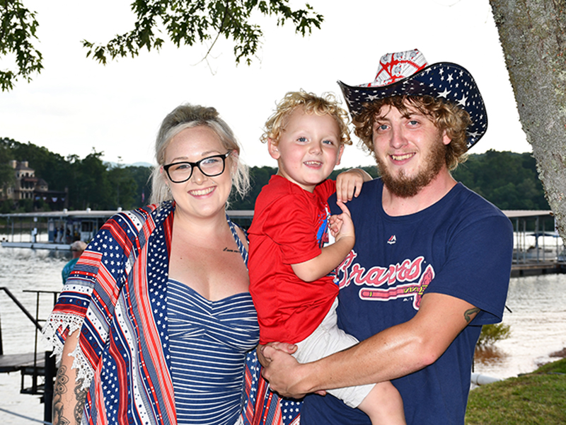 Darby, Austin and little Kaiden waited for fireworks at the Lake Blue Ridge Marina Saturday, July 4.