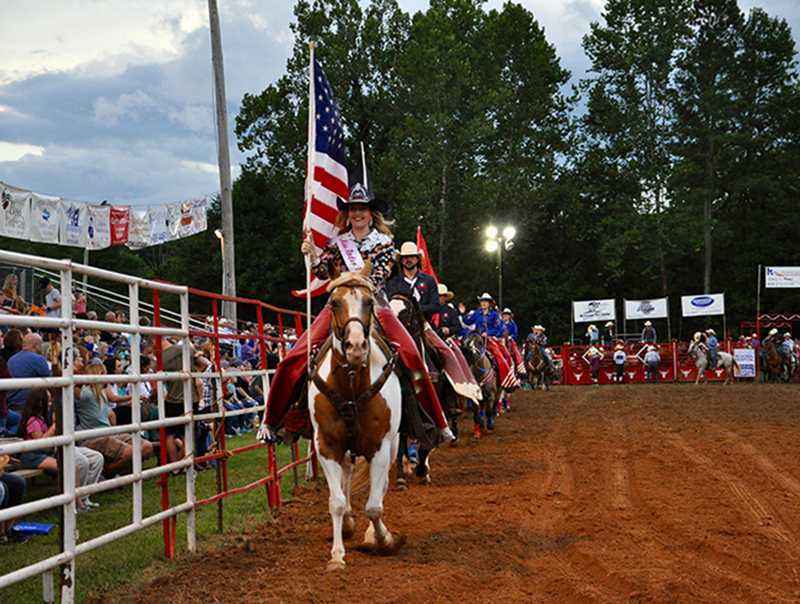 Miss Rodeo U.S.A. Brooke Wallace leads the pack, bringing Friday night’s rodeo to life, August 21.