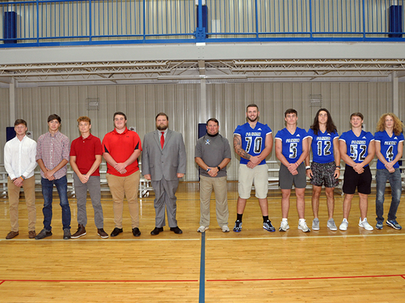 The Copper Basin Cougars and Fannin County Rebels came together Friday, August 7, to answer questions about the upcoming season during the 2020 Media Day. Shown, from left, are Cougars players, Eli Patterson, Dawson Worthy, Timothy Fair, Chance Rollins, Cougars Offensive Coordinator Jeremy Locke, Rebels Head Coach Chad Cheatham, and Rebels players Mason Bundy, Seth Reece, Luke Holloway, Micah O’Neal and Cohutta Hyde.