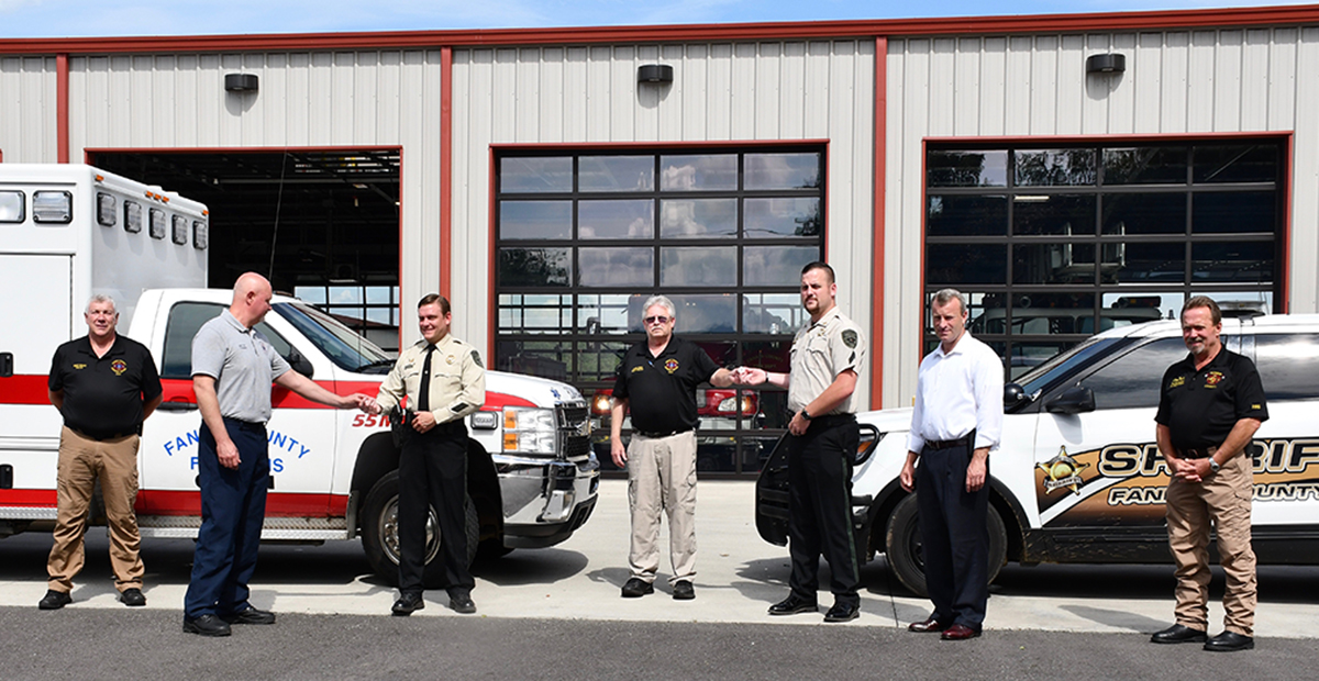 Fannin County Sherriff’s Office Investigator Gary Edwards and Corporal Dustin Carder received life saving pins, Tuesday, July 28, for adminstering Narcan at a vehicle accident before emergency medical services could get there. Shown are, from left, EMA Director Robert Graham, Paramedic Joey Cox, Edwards, EMA Deputy Director Darrell Payne, Carder, Sheriff Dane Kirby and Fire Chief Larry Thomas.